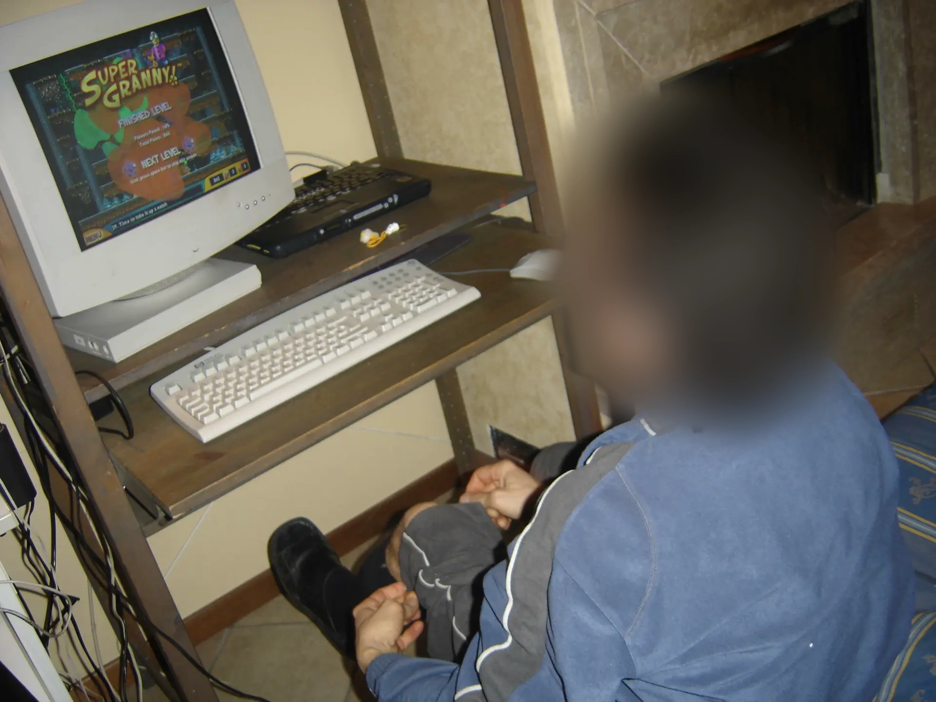 Childhood computer with a game on its CRT monitor
